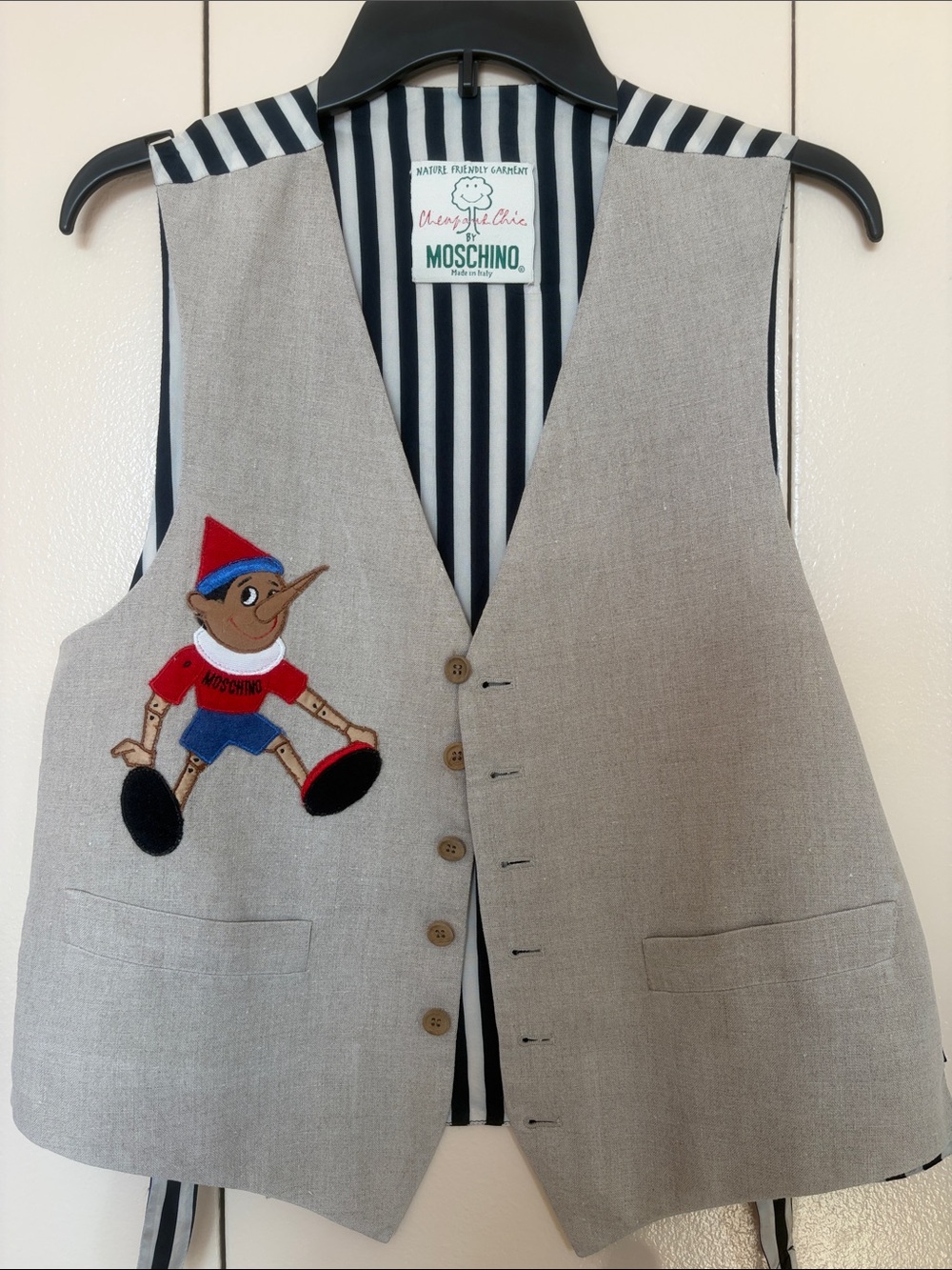 Moschino men Beige Linen Vest with Pinocchio Appliqué - Red & Blue Accents